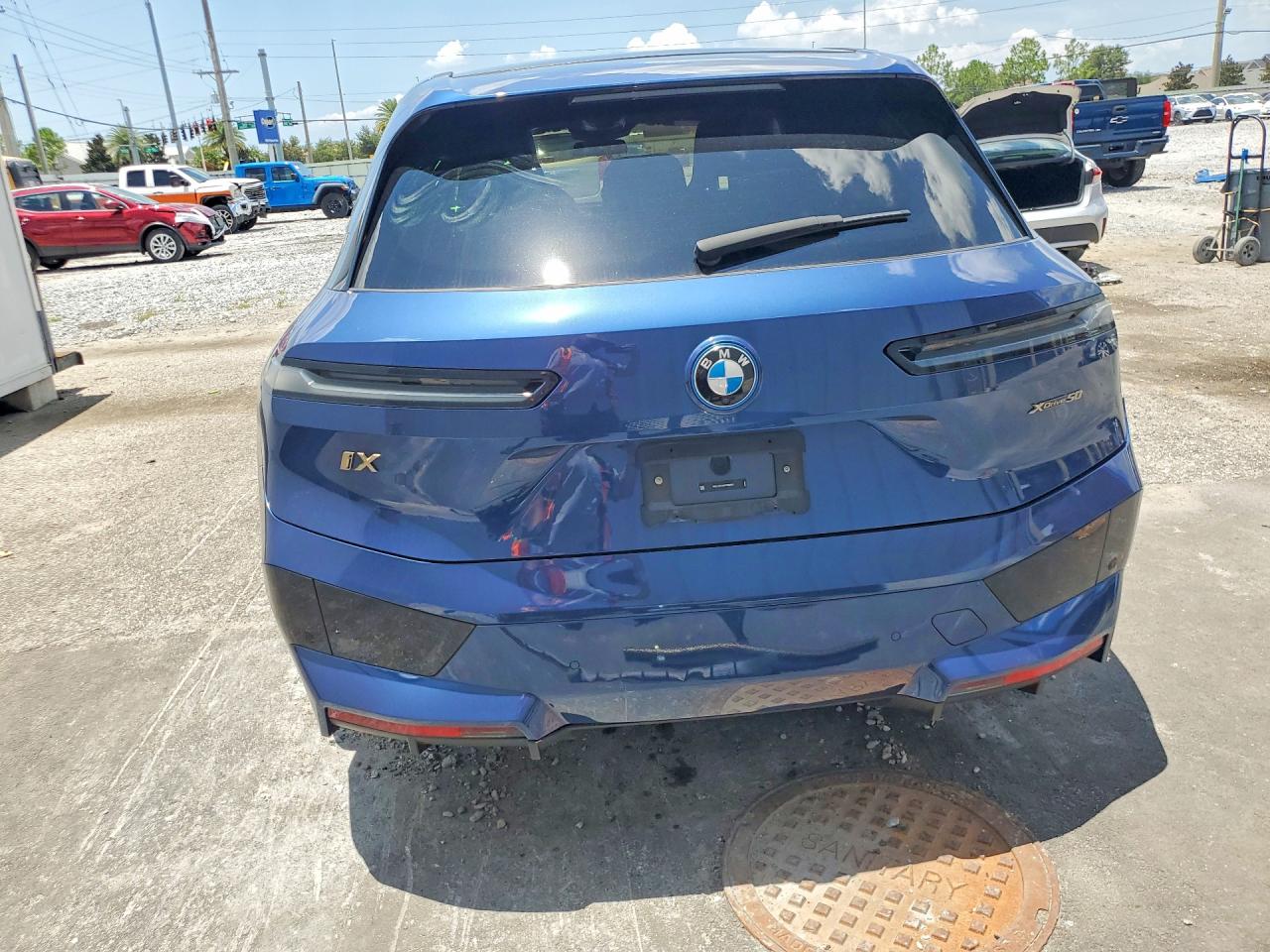 2024 BMW iX VIN WB523CF06RCR08663 COPART salvage auction — Side, FL - CERTIFICATE OF DESTRUCTION, sold $20,100 on 2026-08-28 (photo 6)