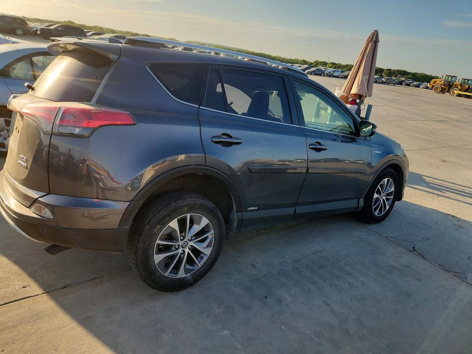 2016 Toyota Rav 4 VIN JTMRJREV9GD015189 COPART salvage auction — SIDE, Tx - Salvage Vehicle Title, sold $175 on 2026-07-27 (photo 3)