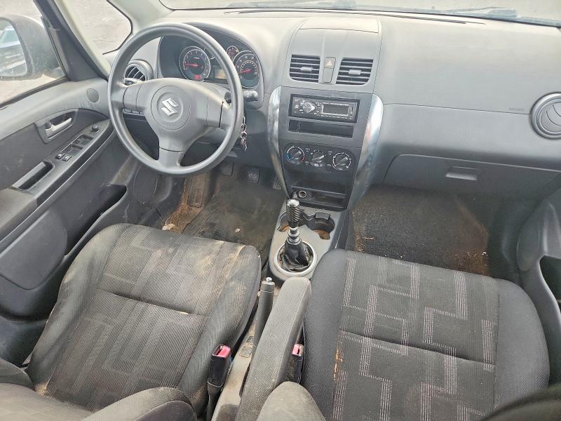 2011 Suzuki Sx4 VIN JS2YC5A26B6300770 COPART salvage auction — MINOR DENT/SCRATCHES, Al - Cert Of Title-Salvage Title, sold $225 on 2026-09-28 (photo 8)