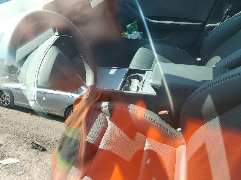 2024 Tesla Model 3 VIN 5YJ3E1EA7RF717550 COPART salvage auction — HAIL, Mo - Salvage Certificate Of Title, sold $16,700 on 2026-09-01 (photo 7)