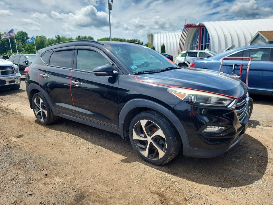 2016 Hyundai Tucson VIN KM8J3CA26GU168656 COPART salvage auction — MINOR DENT/SCRATCHES, MA - CERTIFICATE OF TITLE (P), sold $1,250 on 2026-07-16 (photo 4)