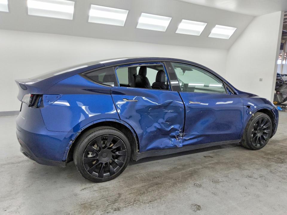 2022 Tesla Model y VIN 7SAYGDEE3NF481237 COPART salvage auction — SIDE, NV - CERTIFICATE OF TITLE, sold $9,700 on 2026-07-20 (photo 3)