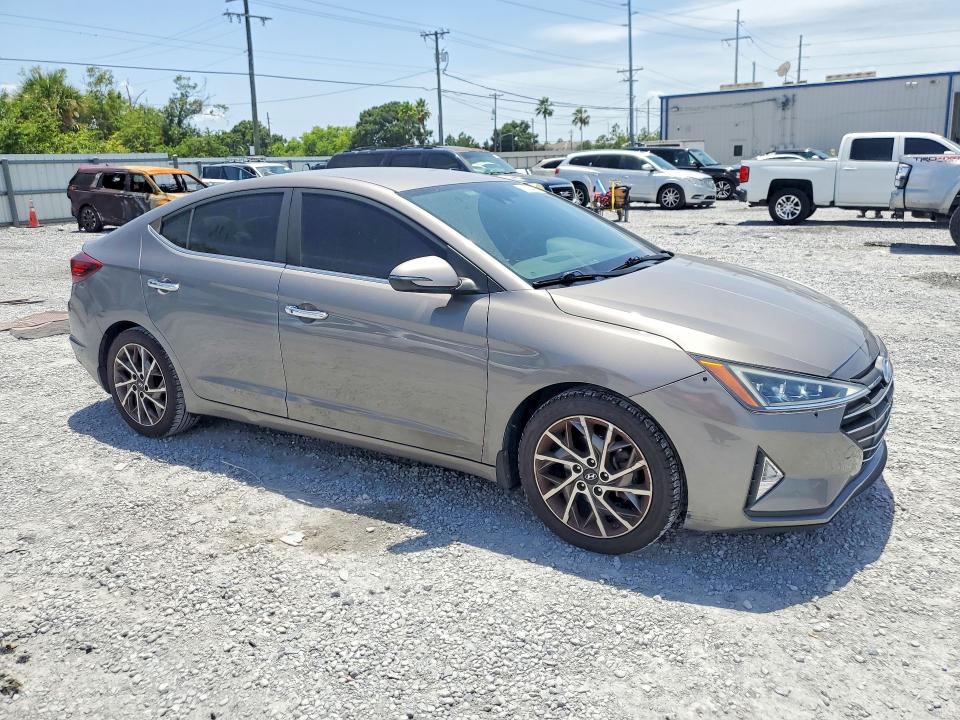 2020 Hyundai Elantra VIN KMHD84LF7LU040571 COPART salvage auction — MINOR DENT/SCRATCHES, Fl - Cert Of Ttl-Rebuilt&Slvg Rbld, sold $2,300 on 2026-07-28 (photo 4)
