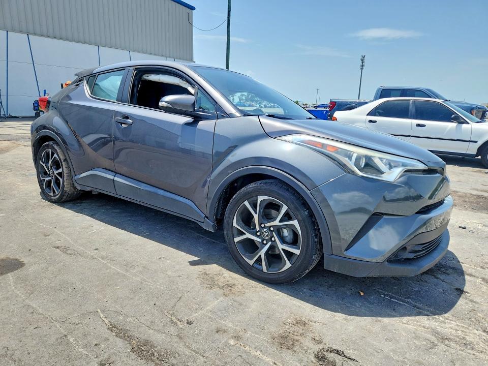 2018 Toyota C-hr VIN NMTKHMBX0JR043544 COPART salvage auction — SIDE, Fl - Cert Of Title Slvg Rebuildable, sold $15 on 2026-07-29 (photo 4)