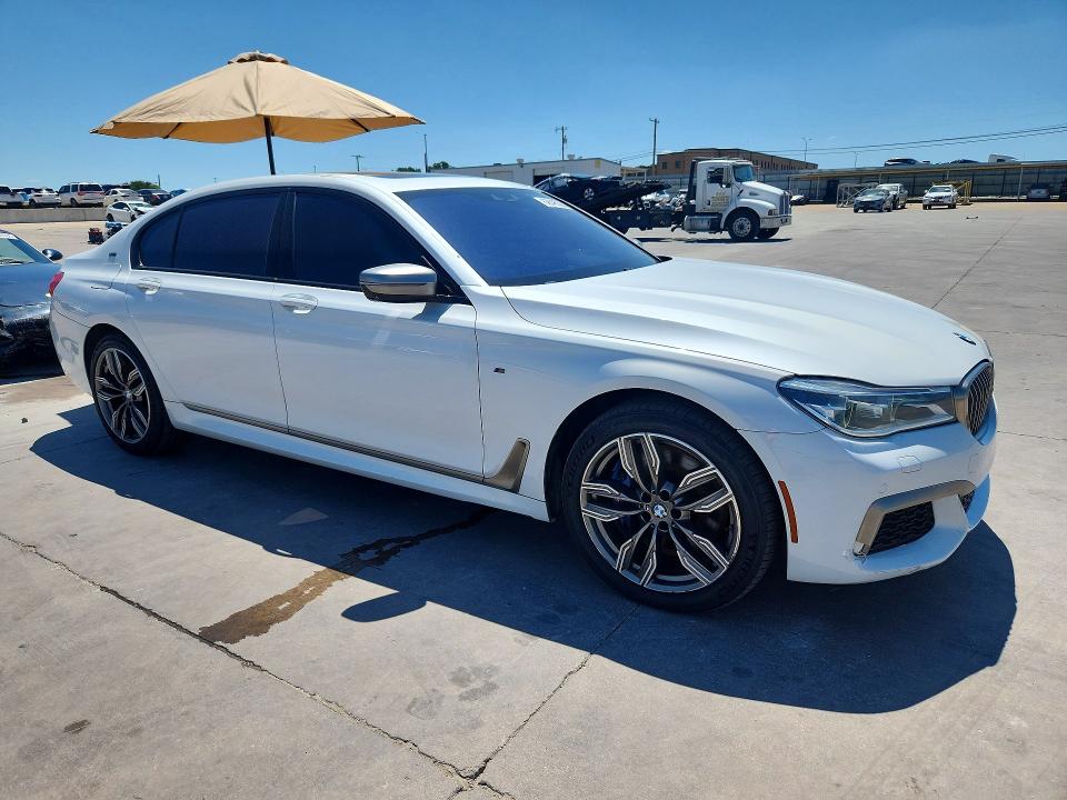 2019 BMW M760i xdrive VIN WBA7H6C58KG615050 COPART salvage auction — NORMAL WEAR, TX - SALVAGE VEHICLE TITLE (P), sold $8,600 on 2026-07-30 (photo 4)