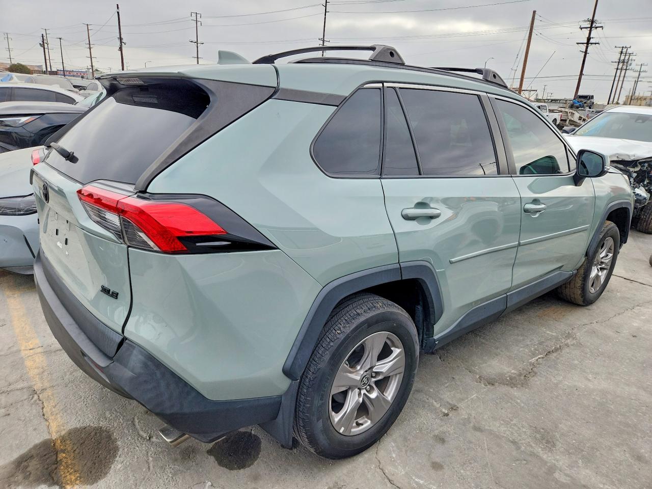 2023 Toyota Rav 4 VIN 2T3W1RFV0PW287635 COPART salvage auction — Side, Sc - Salvage Title, sold $12,900 on 2026-09-11 (photo 3)