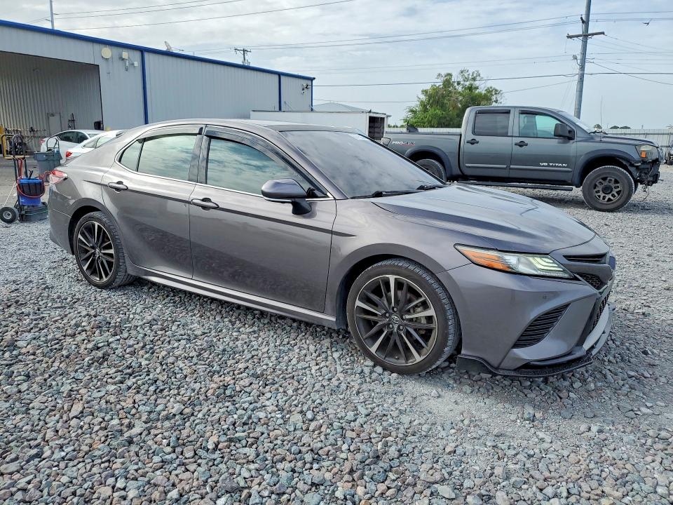 2018 Toyota Camry VIN 4T1B61HK6JU080803 COPART salvage auction — SIDE, Fl - Cert Of Title Slvg Rebuildable, sold $9,700 on 2026-07-31 (photo 4)