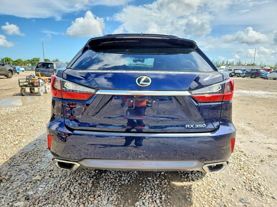 2016 Lexus Rx VIN 2T2ZZMCA1GC020651 COPART salvage auction — MINOR DENT/SCRATCHES, Fl - Certificate Of Title (P), sold $1,300 on 2026-07-21 (photo 6)