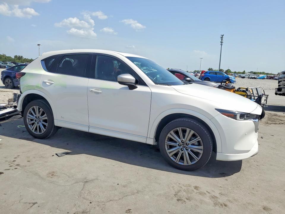 2025 Mazda Cx-90 VIN JM3KKAHD3S1255665 COPART salvage auction — SIDE, Fl - Cert Of Title Slvg Rebuildable, sold $11,300 on 2026-08-24 (photo 4)