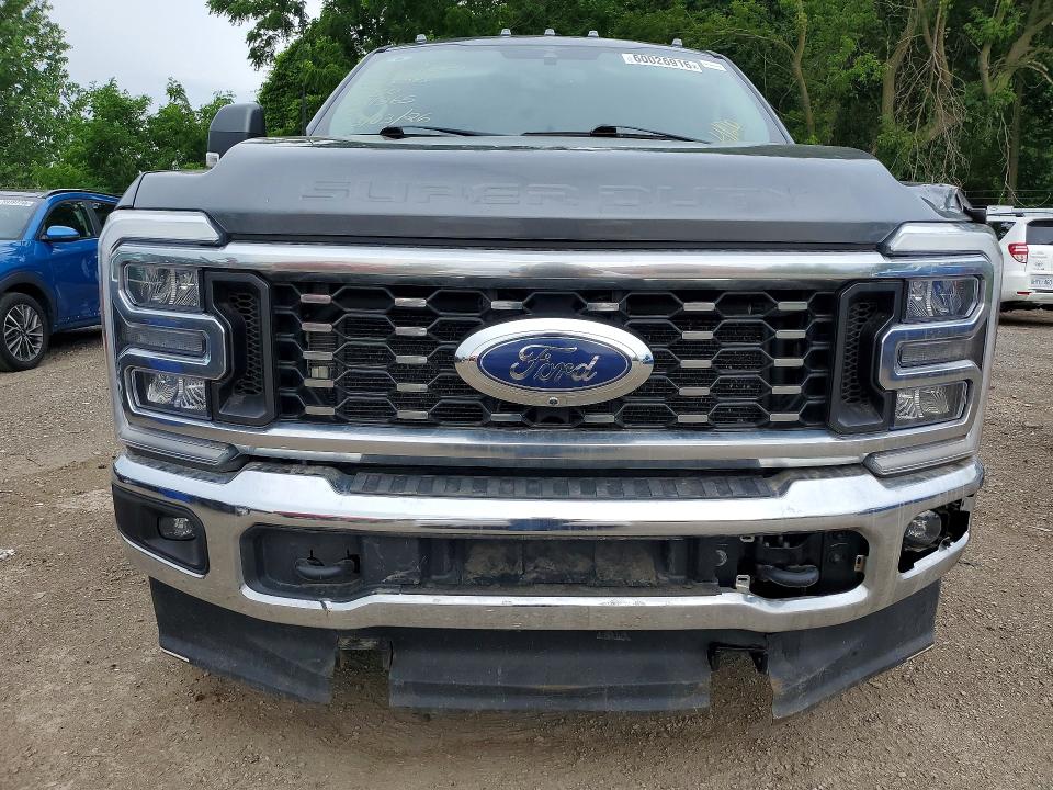 2023 Ford VIN 1FT8W3DT9PED81965 COPART salvage auction — REAR END, On - Permit No Brand - Unfit (P), sold $28,250 on 2026-07-21 (photo 5)