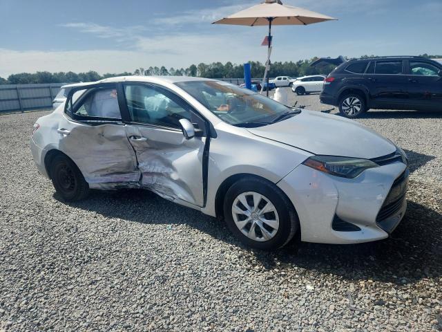 2017 Toyota Corolla VIN 5YFBURHE3HP671827 COPART salvage auction — SIDE, Fl - Cert Of Title Slvg Rebuildable, sold $375 on 2026-07-28 (photo 4)