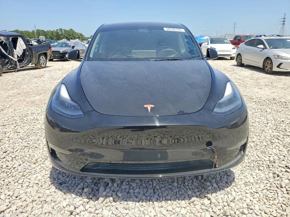 2024 Tesla Model y VIN 7SAYGDED3RA305878 COPART salvage auction — SIDE, Tx - Salvage Vehicle Title, sold $2,900 on 2026-07-24 (photo 5)