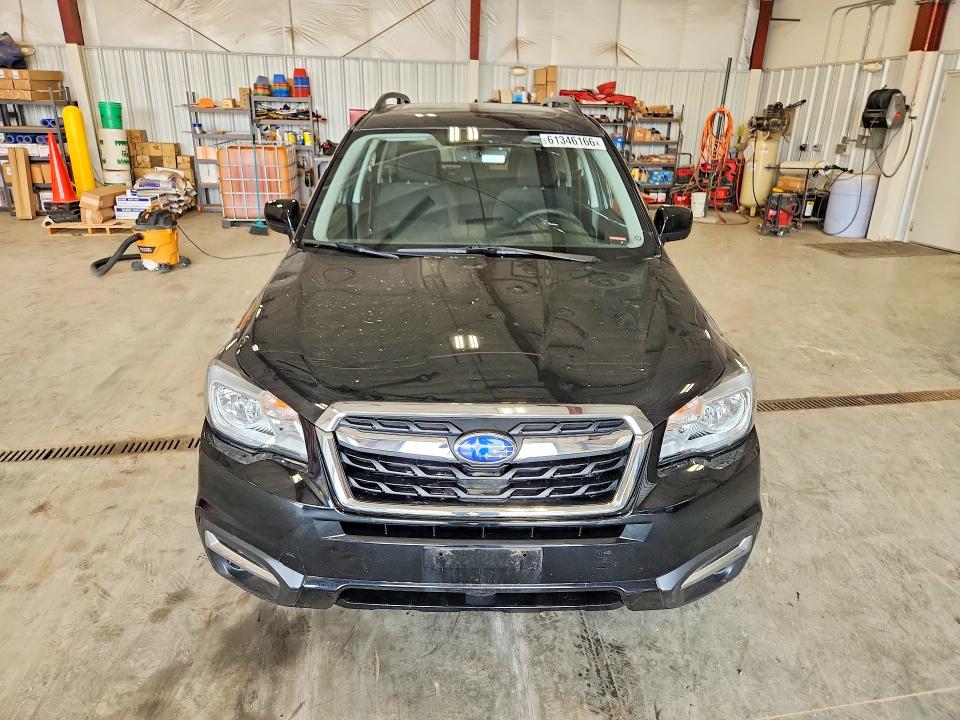 2018 Subaru Forester VIN JF2SJAEC0JH601007 COPART salvage auction — HAIL, WI - CERTIFICATE OF TITLE, sold $9,700 on 2026-09-15 (photo 5)