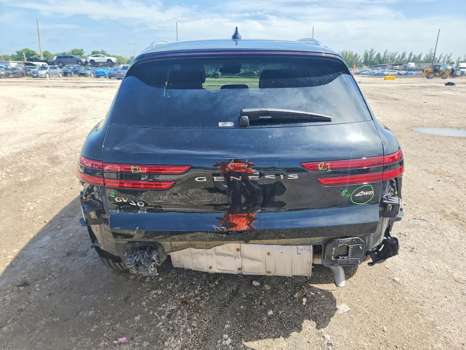 2026 Genesis Gv70 VIN KMUMADTB3TU259174 COPART salvage auction — REAR END, TX - CERTIFICATE OF TITLE (P), sold $14,800 on 2026-07-28 (photo 6)