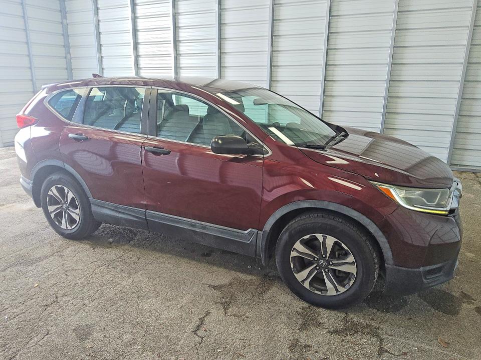 2017 Honda Cr-v VIN 7FARW5H34HE007097 COPART salvage auction — MINOR DENT/SCRATCHES, FL - CERTIFICATE OF TITLE, sold $10,900 on 2026-07-21 (photo 4)