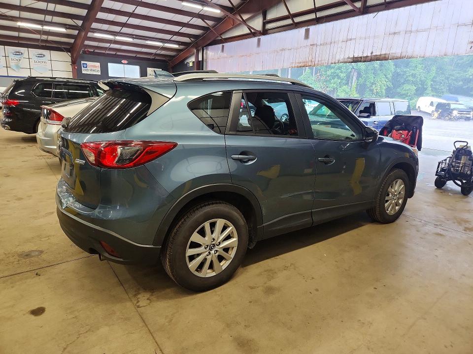2015 Mazda Cx-5 VIN JM3KE4CY1F0531548 COPART salvage auction — SIDE, Vt - Certificate Of Title (P), sold $3,450 on 2026-07-30 (photo 3)