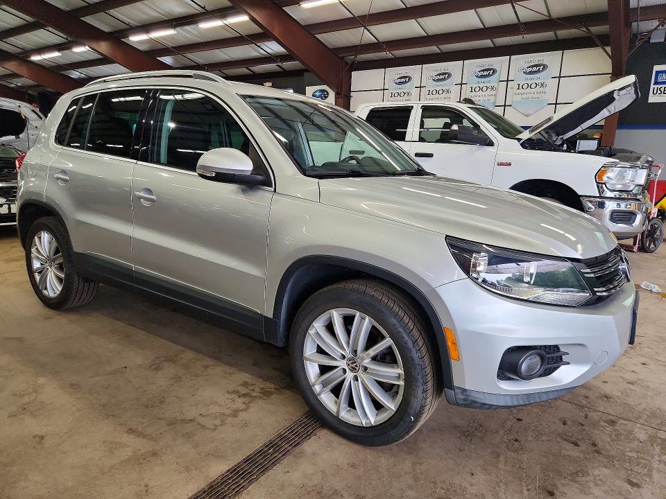 2012 Volkswagen Tiguan VIN WVGBV7AX1CW527346 COPART salvage auction — MINOR DENT/SCRATCHES, Vt - Certificate Of Title (P), sold $1,500 on 2026-07-28 (photo 4)