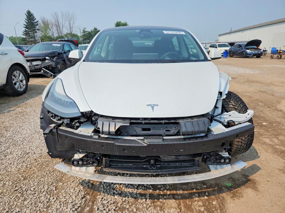 2023 Tesla Model 3 VIN 5YJ3E1EA4PF407014 COPART salvage auction — ALL OVER, ON - PERMIT NO BRAND - UNFIT, sold $3,050 on 2026-07-28 (photo 5)