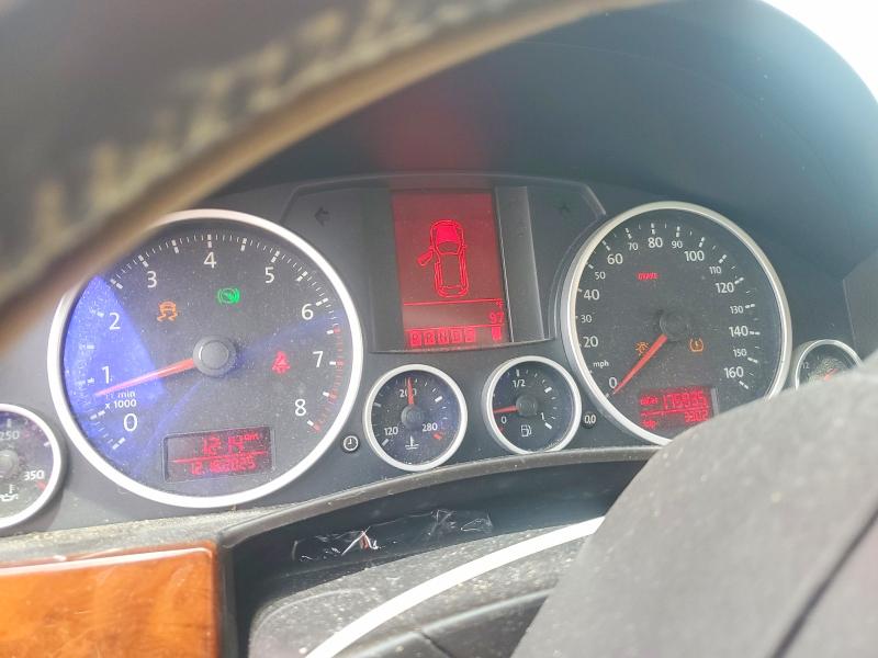 2010 Volkswagen Touareg VIN WVGBF7A95AD004354 COPART salvage auction — NORMAL WEAR, Fl - Certificate Of Title, sold $175 on 2026-08-03 (photo 9)