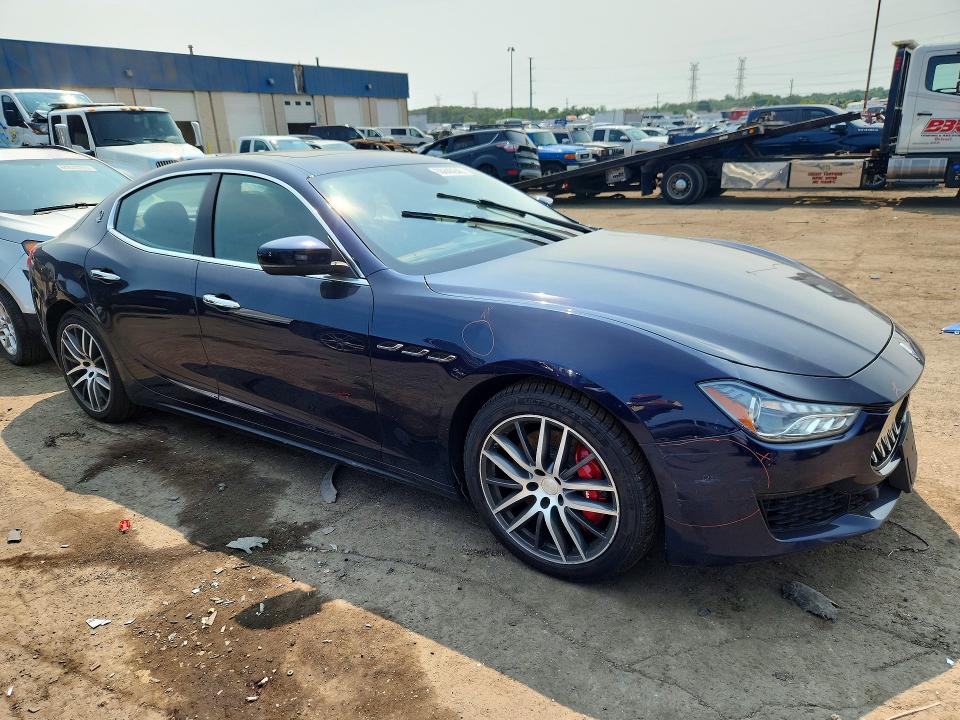 2018 Maserati Ghibli VIN ZAM57YTAXJ1286239 COPART salvage auction — REAR END, MI - DEALER ONLY CLEAN TITLE, sold $1,750 on 2026-07-31 (photo 4)