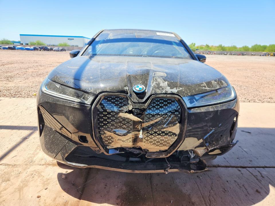2025 BMW Ix VIN WB523CF07SCT06571 COPART salvage auction — REAR END, Salvage Title, sold $17,000 on 2026-08-25 (photo 5)