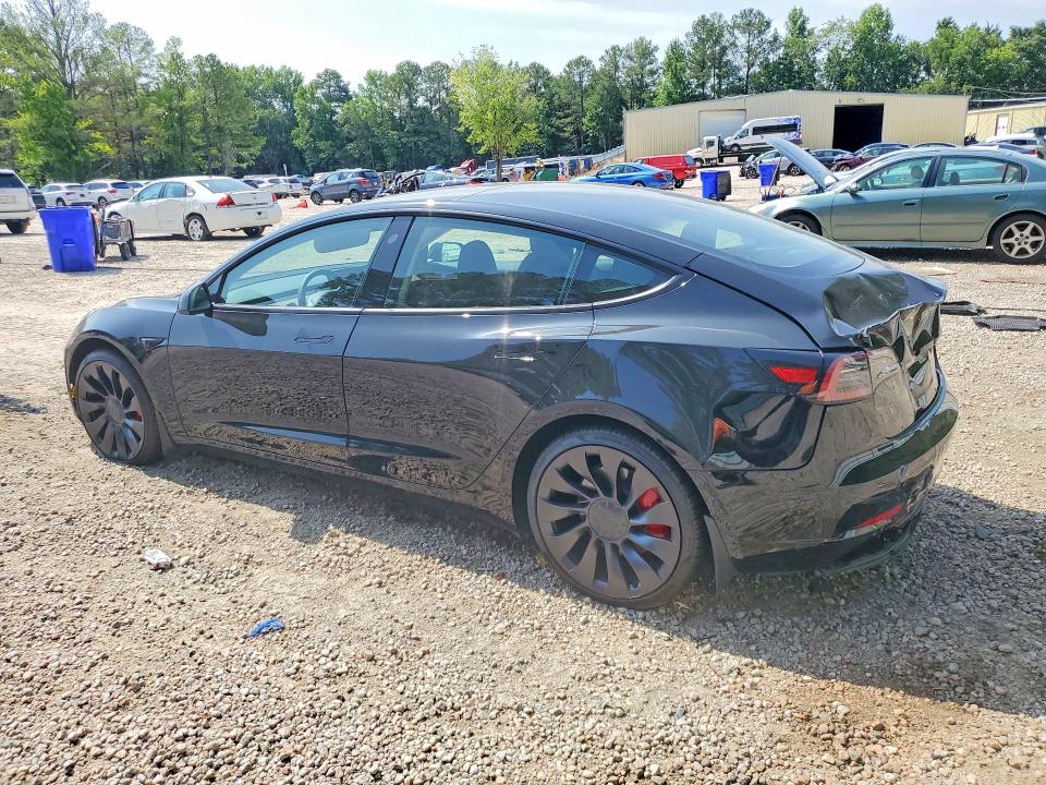 2023 Tesla Model 3 VIN 5YJ3E1EC6PF675483 COPART salvage auction — REAR END, NC - SALVAGE CERTIFICATE OF TITLE, sold $9,100 on 2026-07-31 (photo 2)