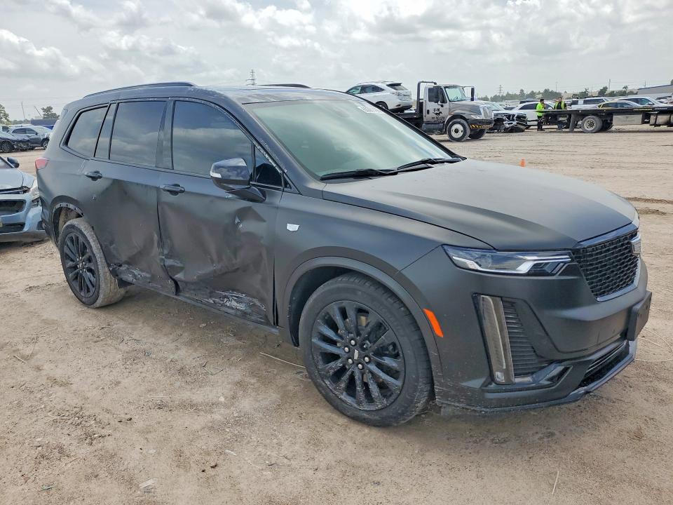 2024 Cadillac Xt6 VIN 1GYKPCRS1RZ734739 COPART salvage auction — SIDE, Tx - Salvage Vehicle Title, sold $10,800 on 2026-07-31 (photo 4)