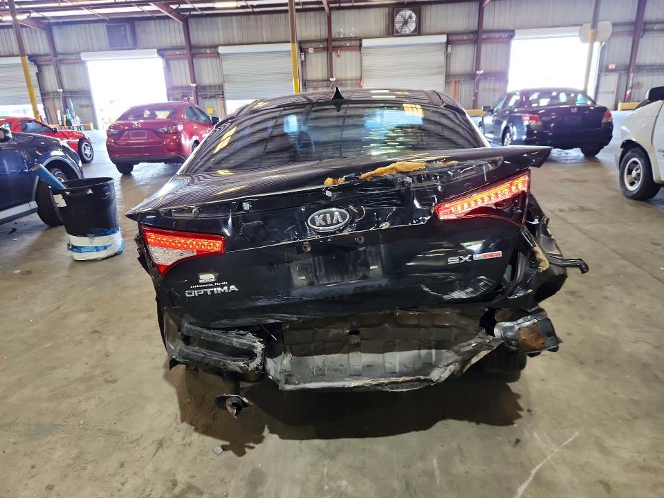 2012 Kia VIN 5XXGR4A68CG003858 COPART salvage auction — REAR END, FL - CERT OF TITLE SLVG REBUILDABLE, sold $700 on 2026-07-27 (photo 6)