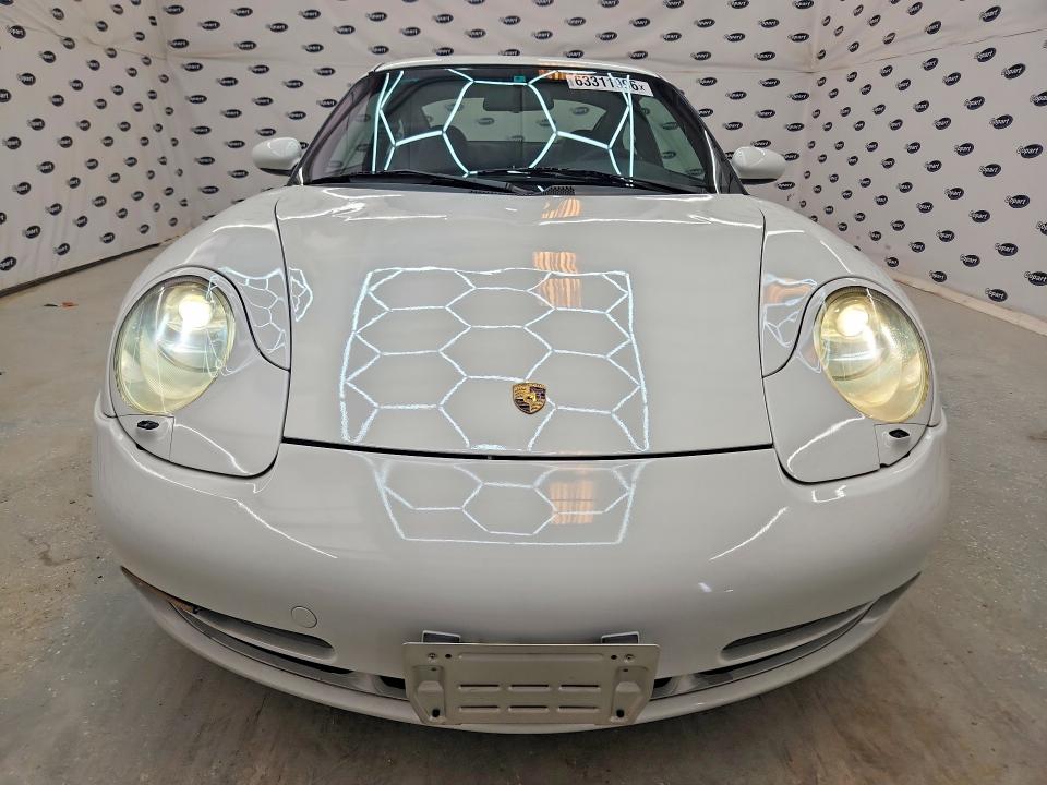 1999 Porsche 911 VIN WP0ZZZ99ZXS603275 COPART salvage auction — MINOR DENT/SCRATCHES, Tx - Certificate Of Title, sold $7,700 on 2026-08-04 (photo 5)