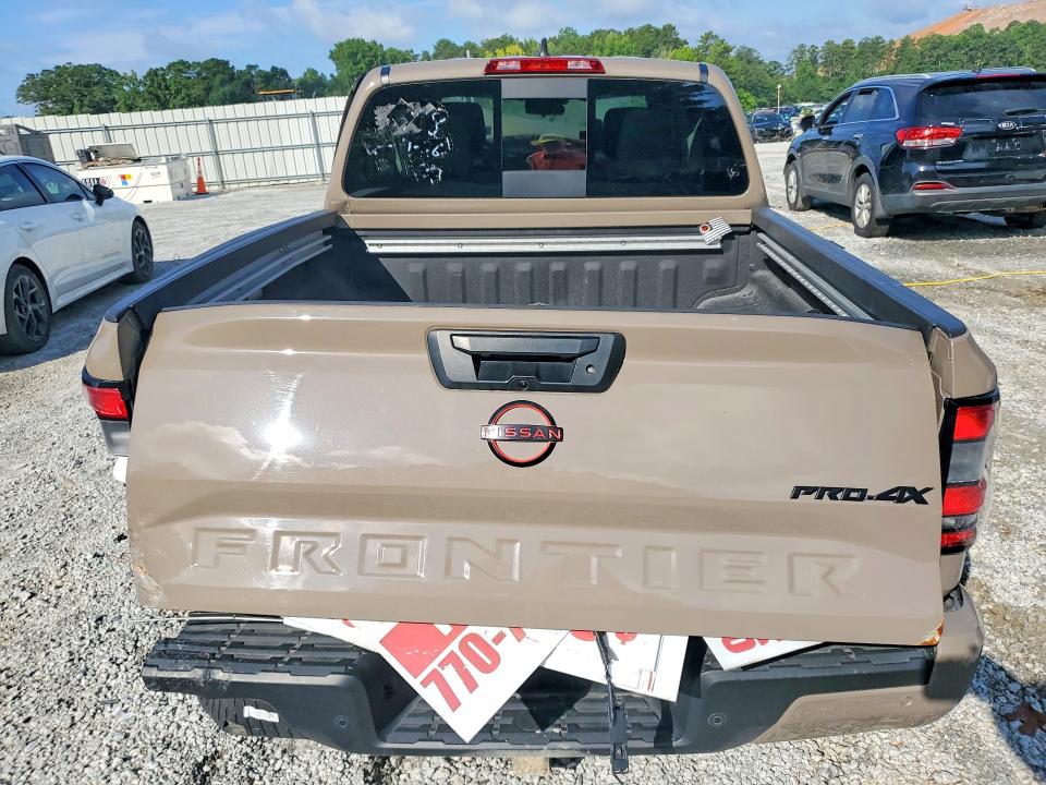 2024 Nissan Frontier VIN 1N6ED1EK2RN616998 COPART salvage auction — ALL OVER, WA - VEHICLE CERT OF OWNERSHIP-TITL (P), sold $7,400 on 2026-07-28 (photo 6)