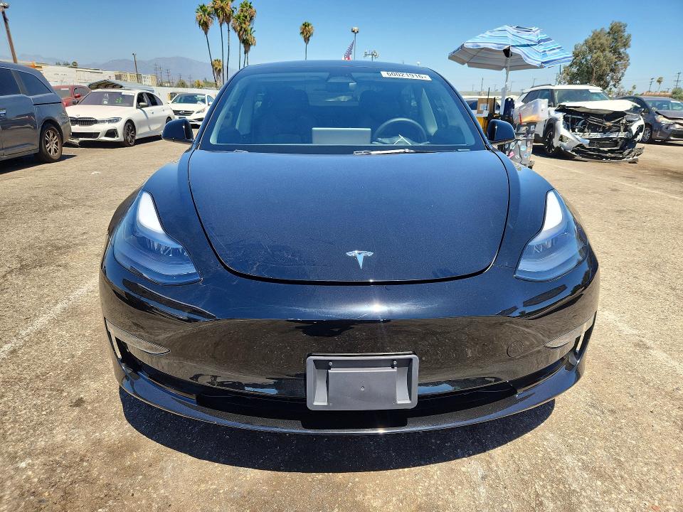 2023 Tesla Model 3 VIN 5YJ3E1EA7PF698947 COPART salvage auction — NORMAL WEAR, Ca - Salvage Certificate (P), sold $13,700 on 2026-07-24 (photo 5)