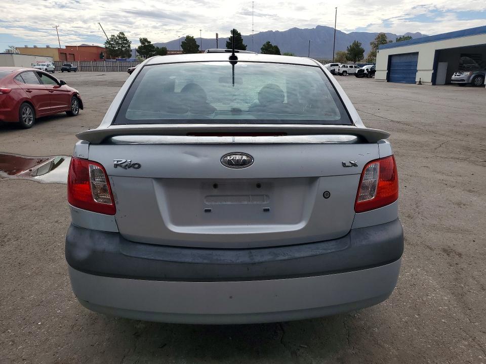2009 Kia Rio VIN KNADE223X96451207 COPART salvage auction — FRONT END, TX - SALVAGE VEHICLE TITLE (P), sold $125 on 2026-07-31 (photo 6)