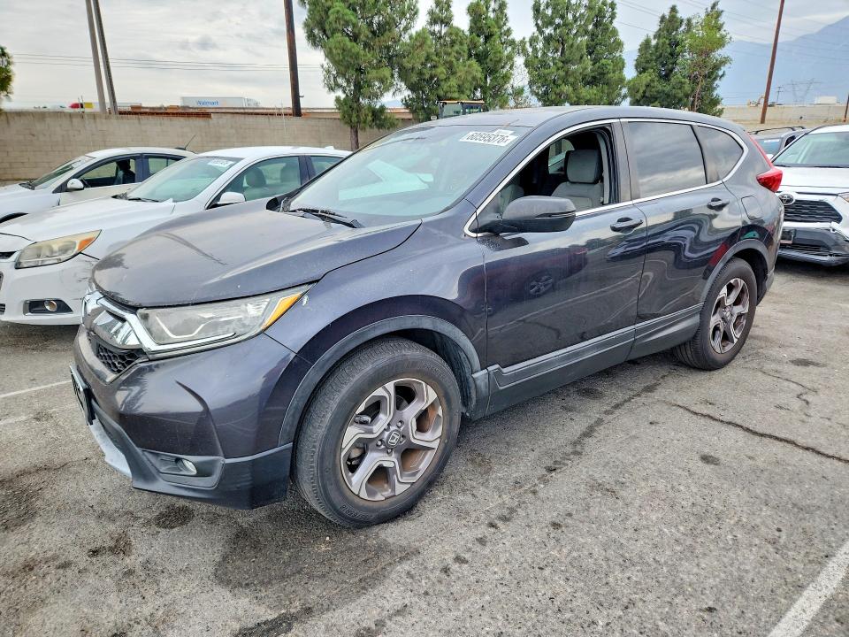 2017 Honda Cr-v VIN 7FARW1H57HE015771 COPART salvage auction — MINOR DENT/SCRATCHES, Ca - Dis/Dlr/Exp Only Clean Title (P), sold $7,400 on 2026-07-30 (photo 1)