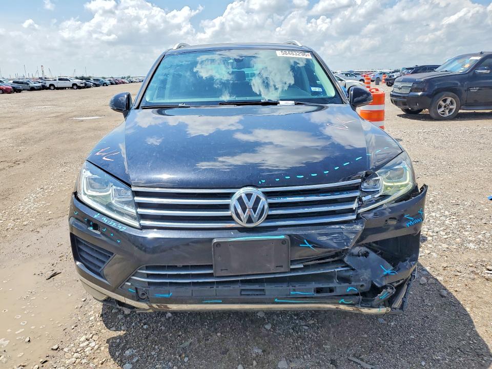 2015 Volkswagen VIN WVGEF9BP5FD004660 COPART salvage auction — SIDE, TX - SALVAGE VEHICLE TITLE (P), sold $875 on 2026-07-09 (photo 5)