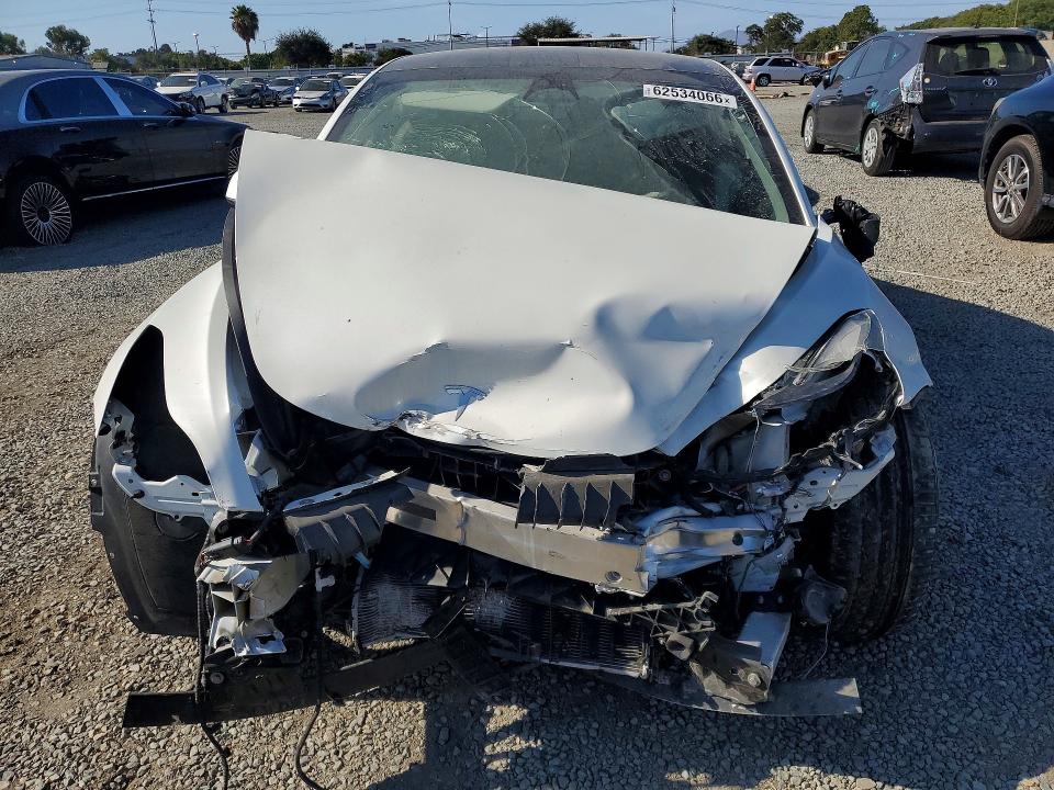 2023 Tesla Model 3 VIN 5YJ3E1EA3PF586811 COPART salvage auction — FRONT END, Ca - Salvage Certificate, sold $3,100 on 2026-07-31 (photo 5)