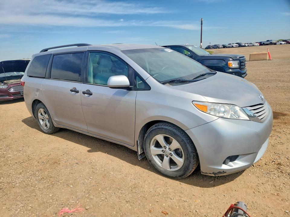 2015 Toyota Sienna VIN 5TDZK3DC5FS574543 COPART salvage auction — HAIL, Ab - Bos - Nonrepairable, sold $2,750 on 2026-07-28 (photo 4)