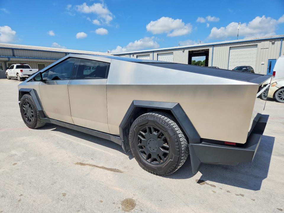 2024 Tesla Cybertruck VIN 7G2CEHEE9RA026641 COPART salvage auction — DAMAGE HISTORY, Tx - Cert Of Title-Rebuilt Salvage (P), sold $40,000 on 2026-07-17 (photo 2)
