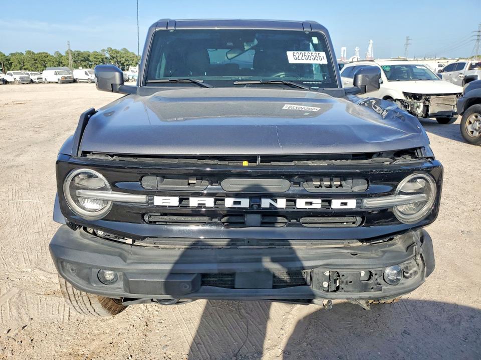 2024 Ford Bronco VIN 1FMDE8BHXRLA46687 COPART salvage auction — SIDE, Tx - Certificate Of Title, sold $17,400 on 2026-07-28 (photo 5)