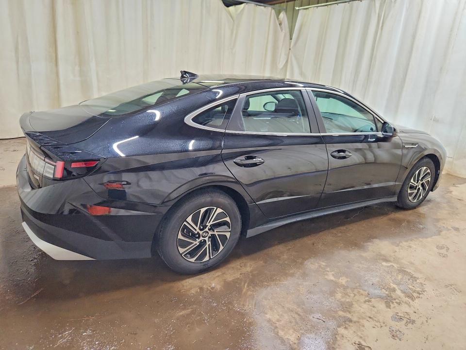 2026 Hyundai Sonata hybrid VIN KMHL24JJ8TA172714 COPART salvage auction — WATER/FLOOD, FL - CERT OF TITLE-SLVG REBLD FLOOD (P), sold $8,900 on 2026-07-27 (photo 3)