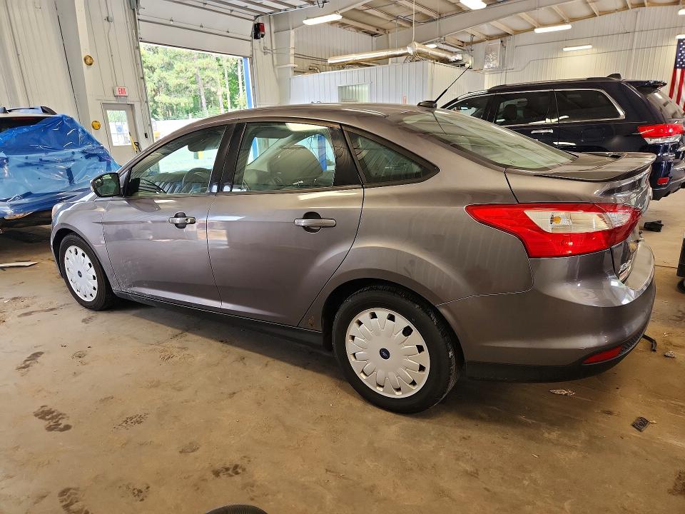 2014 Ford Focus VIN 1FADP3F22EL383300 COPART salvage auction — MINOR DENT/SCRATCHES, Mn - Non Public Clean Title, sold $650 on 2026-08-01 (photo 2)