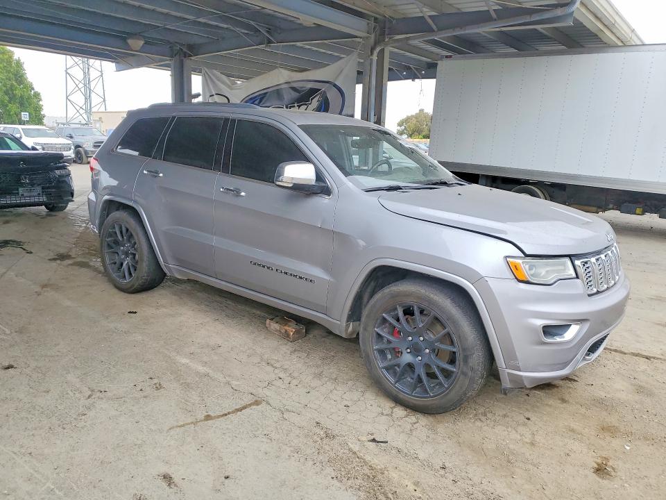 2017 Jeep Grand cherokee VIN 1C4RJECG0HC740202 COPART salvage auction — MINOR DENT/SCRATCHES, Mt - Dis/Dlr/Exp Only Clean Title, sold $5,000 on 2026-08-07 (photo 4)