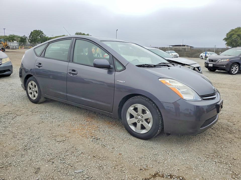 2007 Toyota Prius VIN JTDKB20U273265559 COPART salvage auction — MINOR DENT/SCRATCHES, Ca - Dis/Dlr/Exp Only Clean Title, sold $875 on 2026-07-31 (photo 4)