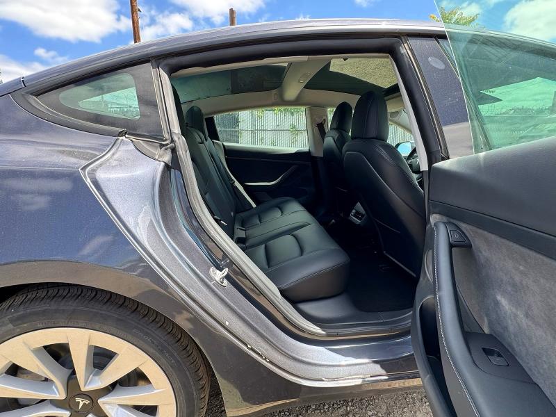 2022 Tesla Model 3 VIN 5YJ3E1EA5NF185418 COPART salvage auction — NORMAL WEAR, OR - CERTIFICATE OF TITLE (P), sold $22,300 on 2026-07-28 (photo 6)
