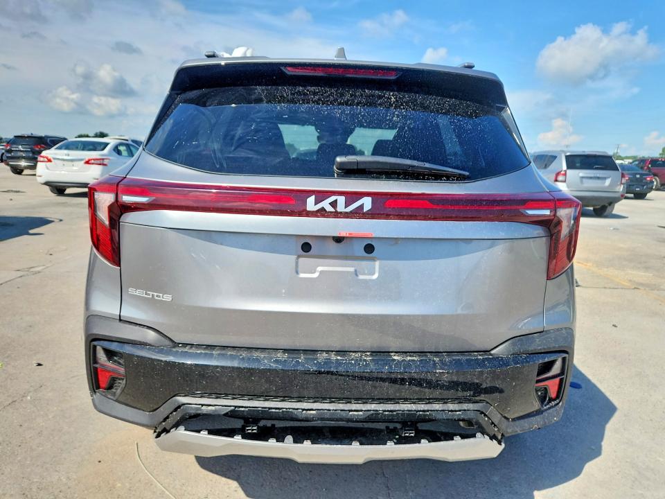 2026 Kia Seltos VIN KNDER2AA1T7947963 COPART salvage auction — WATER/FLOOD, MI - CERT OF TITLE-SALVAGE FLOOD, sold $12,700 on 2026-08-12 (photo 6)