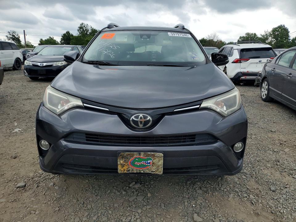 2018 Toyota Rav 4 VIN JTMRFREV4JJ246219 COPART salvage auction — SIDE, Fl - Cert Of Title-Salvage Theft, sold $7,300 on 2026-07-17 (photo 5)