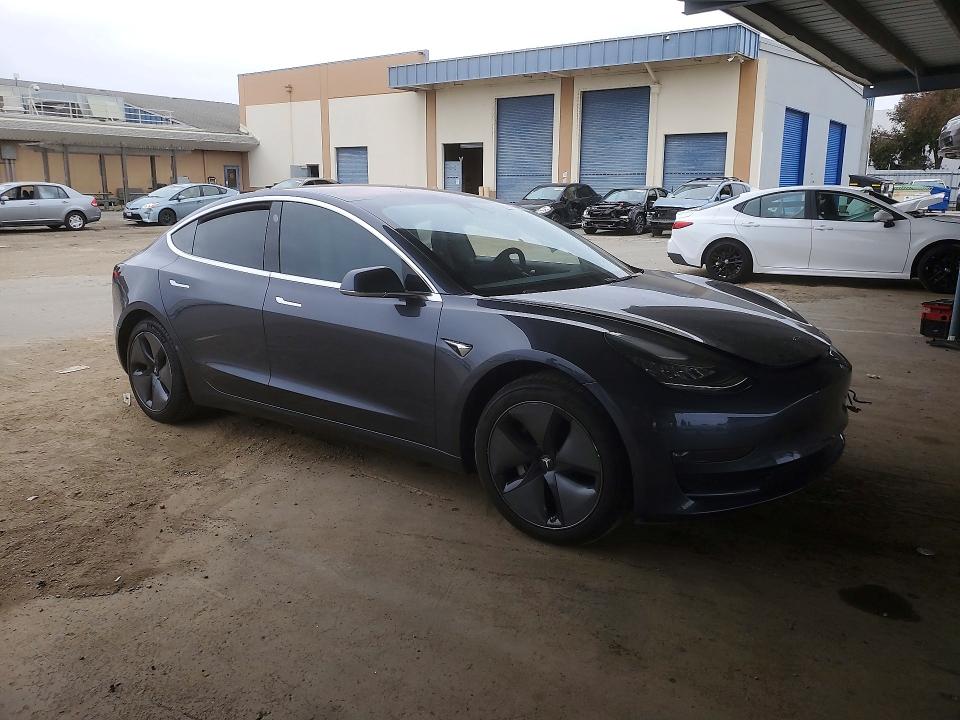 2018 Tesla VIN 5YJ3E1EB4JF129005 COPART salvage auction — SIDE, Ca - Salvage Certificate, sold $4,550 on 2026-07-19 (photo 4)