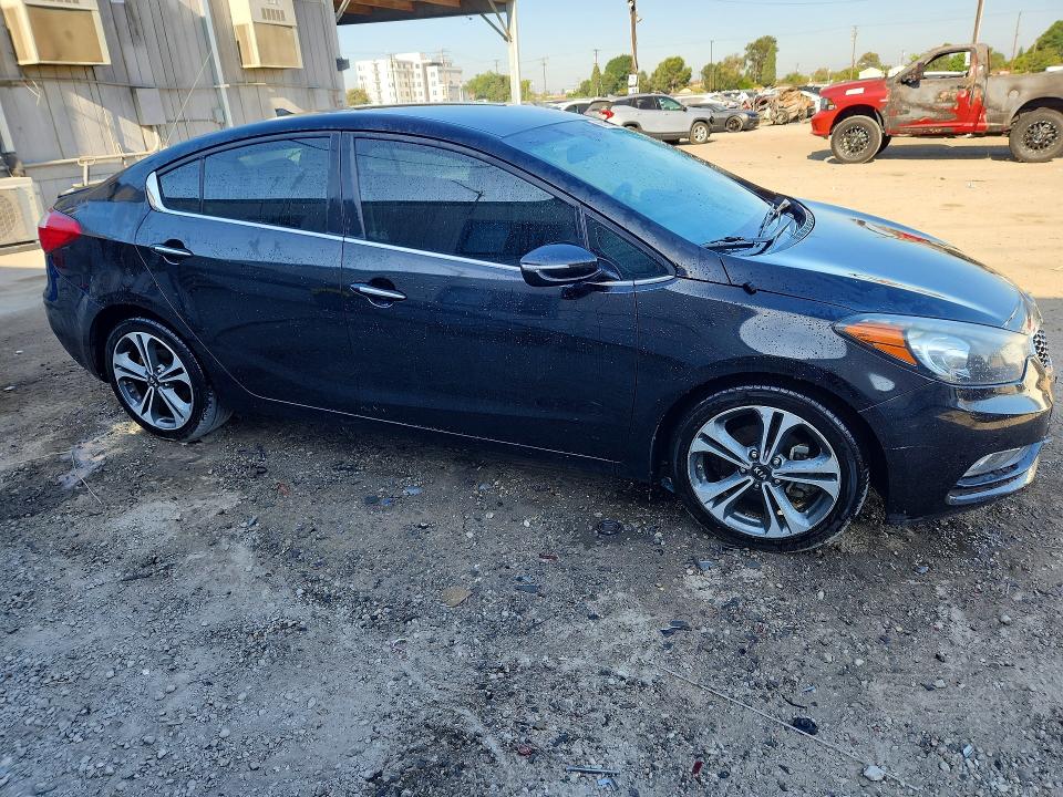 2016 Kia Forte VIN KNAFX4A80G5523479 COPART salvage auction — NORMAL WEAR, Ca - Dis/Dlr/Exp Only Clean Title, sold $650 on 2026-07-27 (photo 4)