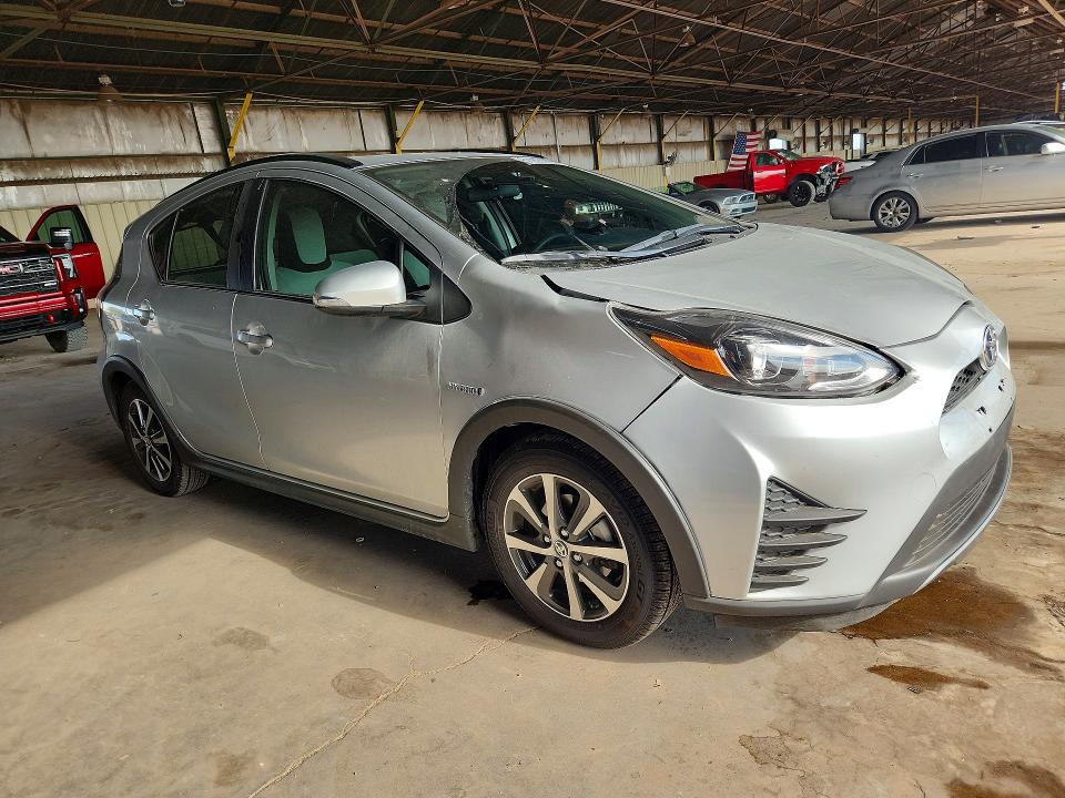 2018 Toyota Prius c VIN JTDKDTB34J1614566 COPART salvage auction — REAR END, AZ - CERT OF TITLE - SALVAGE, sold $2,650 on 2026-07-27 (photo 4)