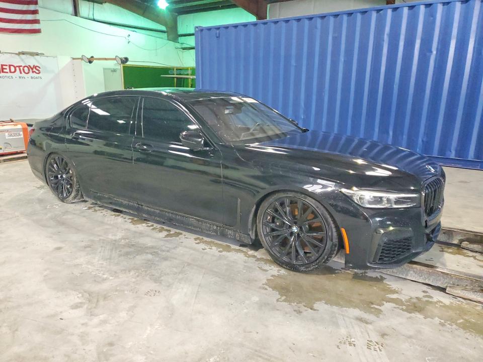 2022 BMW 7er VIN WBA7U2C02NCH74671 COPART salvage auction — WATER/FLOOD, Fl - Certificate Of Destruction, sold $16,200 on 2026-08-05 (photo 4)