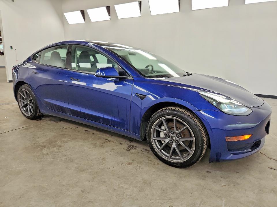 2022 Tesla Model 3 VIN 5YJ3E1EA5NF285728 COPART salvage auction — REAR END, IL - CERTIFICATE OF TITLE, sold $2,100 on 2026-07-27 (photo 4)